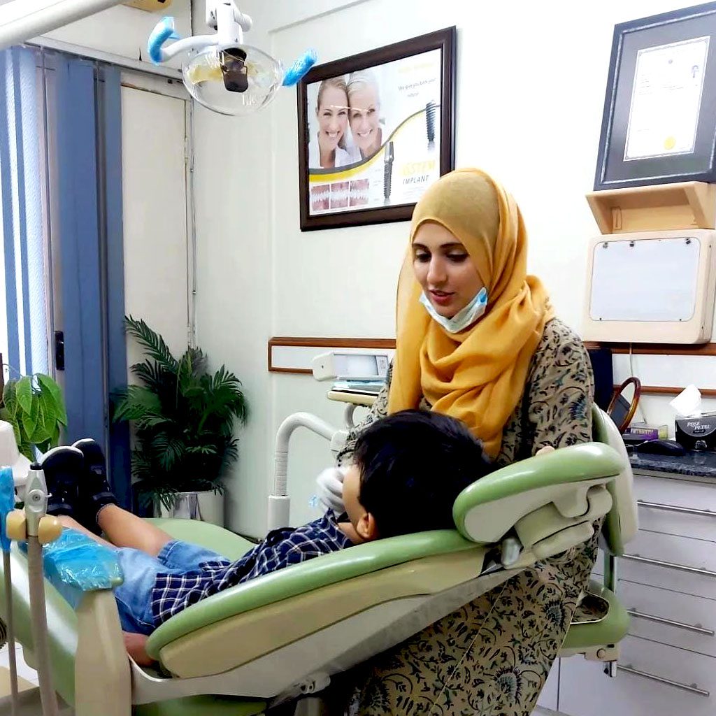 Dr.-Faiqa-Adil-Waqas-with-Patient
